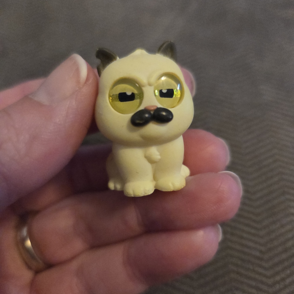 Disney Cream and Black Pug Toy Figure
